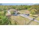 Aerial view of the house showcasing the circular driveway, and expansive fenced in yard at 6346 Dallas Blvd, Orlando, FL 32833