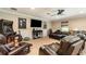 A large entertainment room features recliner seating, an arcade game, and media at 6346 Dallas Blvd, Orlando, FL 32833