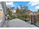 Outdoor balcony with black metal railings overlooking the backyard at 721 Delaney Ave, Orlando, FL 32801