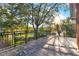 Spacious balcony with iron railings offering beautiful views of the surrounding greenery at 721 Delaney Ave, Orlando, FL 32801