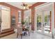 Cozy breakfast nook with brick walls, tiled floor, and natural light at 721 Delaney Ave, Orlando, FL 32801