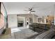 Spacious living room adjacent to kitchen and dining, showcasing tile floors and neutral wall colors at 970 Picasso Ave, Deltona, FL 32738