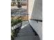 Concrete staircase with black railing leading up to the condo at 1055 S Hiawassee Rd # 2027, Orlando, FL 32835