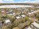 Aerial view of the neighborhood with tree-lined streets and a lake at 1531 Lake Baldwin Ln, Orlando, FL 32814