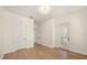 Bedroom with hardwood floors, featuring an en-suite entrance to an enclosed porch at 1531 Lake Baldwin Ln, Orlando, FL 32814