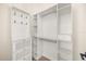 A well-organized closet space with shelves, drawers and rods at 1531 Lake Baldwin Ln, Orlando, FL 32814