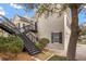 Two-story apartment building featuring metal stairs to the second-floor units and well-maintained landscaping at 1531 Lake Baldwin Ln, Orlando, FL 32814