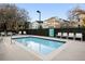 Cozy pool offers a refreshing escape with nearby seating areas surrounded by well-maintained landscaping and greenery at 1531 Lake Baldwin Ln, Orlando, FL 32814