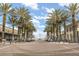 Palm tree-lined street with shops and restaurants on either side at 1531 Lake Baldwin Ln, Orlando, FL 32814