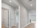 Bright hallway featuring neutral paint and tile flooring at 1630 Laia Rd, Haines City, FL 33844