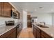 Spacious kitchen featuring stainless steel appliances and granite countertops at 1630 Laia Rd, Haines City, FL 33844