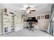 Bedroom featuring neutral walls, plush carpet, ceiling fan, and built-in shelving at 1804 Wind Willow Rd, Belle Isle, FL 32809