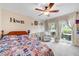 Cozy bedroom with carpet, chair and curtains at 1804 Wind Willow Rd, Belle Isle, FL 32809