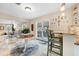 Breakfast nook next to the kitchen and dining room featuring tile floors at 1804 Wind Willow Rd, Belle Isle, FL 32809