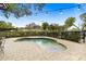 Inviting backyard pool with paver patio, lush landscaping, and string lights for evening ambiance at 1804 Wind Willow Rd, Belle Isle, FL 32809