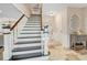 Staircase featuring wood and white painted surfaces and tile floors at 1804 Wind Willow Rd, Belle Isle, FL 32809