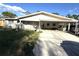 Charming single-story home with covered carport and well-maintained front yard at 1808 4Th Se Ct, Winter Haven, FL 33880