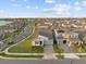 Aerial view of a residential community with sidewalks and numerous single-Gathering homes at 19307 Banfield Pl, Orlando, FL 32827