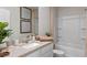 Well-lit bathroom with a modern vanity, framed mirror, and a shower-tub combination at 2144 Monteverde Ave, Davenport, FL 33896