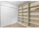 Room with an array of built-in shelving and closet at 257 Sheppard St, Altamonte Springs, FL 32701