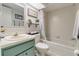 Bright bathroom featuring tub, vanity, and neutral finishes for a clean aesthetic at 3467 Flossmoor Ave # 101, Orlando, FL 32822