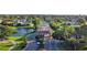 A gated community entrance features a lake view at 3960 Southpointe Dr # 509, Orlando, FL 32822