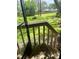 A view of a well-manicured backyard, seen from a porch at 417 Evesham Pl, Longwood, FL 32779