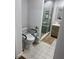 Bathroom featuring updated shower, vanity, and patterned tile floor at 417 Evesham Pl, Longwood, FL 32779