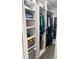 Walk in closet with ample shelving and space for clothing and accessories at 417 Evesham Pl, Longwood, FL 32779