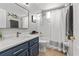 Bathroom with modern vanity, sink, and combined shower and tub with white shower curtain at 548 Hebrides Ct, Apopka, FL 32712