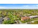 Aerial view of the community featuring mature trees, landscaping, and a central location at 6007 Scotchwood Gln # 37, Orlando, FL 32822