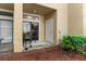 Back patio area with an outdoor grill, ideal for entertaining or relaxation at 6007 Scotchwood Gln # 37, Orlando, FL 32822