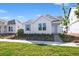 Beautiful single-story home featuring a bright white exterior and landscaped front lawn at 6383 Trailblaze Bnd, St Cloud, FL 34771