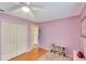 ' bedroom with bookcase, closet and open door at 647 Holbrook Ave, Deltona, FL 32738