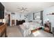 Spacious main bedroom featuring neutral walls, a ceiling fan, and a large window at 805 Leopard Trl, Winter Springs, FL 32708