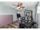 Workout room with equipment, ceiling fan, and multiple windows at 805 Leopard Trl, Winter Springs, FL 32708