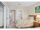 Comfortable bedroom showcasing twin beds, a closet, and an ensuite bathroom at 8276 Maritime Flag St # 110, Windermere, FL 34786