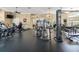 Fully-equipped gym with modern exercise machines, weights, and plenty of space for workouts at 8276 Maritime Flag St # 110, Windermere, FL 34786