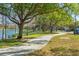 Scenic walking path along a tranquil lake, offering a peaceful and picturesque setting at 8276 Maritime Flag St # 110, Windermere, FL 34786