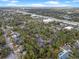 An aerial view showcasing the community's layout, landscaping, nearby highways, and surrounding area at 940 Douglas Ave # 189, Altamonte Springs, FL 32714