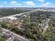 An aerial view captures the community's layout, showcasing landscaping and nearby highways at 940 Douglas Ave # 189, Altamonte Springs, FL 32714