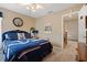 Bedroom with neutral carpet and nautical-themed decor, creating a relaxing and stylish atmosphere at 940 Douglas Ave # 189, Altamonte Springs, FL 32714