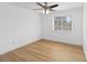 Bright bedroom featuring wood floors, and large window at 9516 Darien Ave # 9516, Orlando, FL 32817