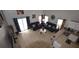 Bright living room with modern furniture and an open layout to the kitchen at 954 Lockbreeze Dr, Davenport, FL 33897