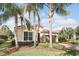 Charming single-story home with lush landscaping and a two-car garage at 11866 Barletta Dr, Orlando, FL 32827