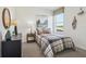 Cozy bedroom with natural light, a comfortable bed, and tasteful decor at 1507 Fountain View St, Ormond Beach, FL 32174