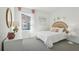 Serene bedroom with a comfortable bed, soft carpet, and a bright window at 1507 Fountain View St, Ormond Beach, FL 32174