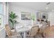 Elegant dining room with decorative accents and view of the kitchen at 1507 Fountain View St, Ormond Beach, FL 32174