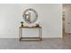 Bright foyer with tile floors, console table with round mirror above, and neutral colored walls at 1507 Fountain View St, Ormond Beach, FL 32174