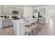 Contemporary kitchen with stainless appliances, a large island, and gray cabinetry at 1507 Fountain View St, Ormond Beach, FL 32174